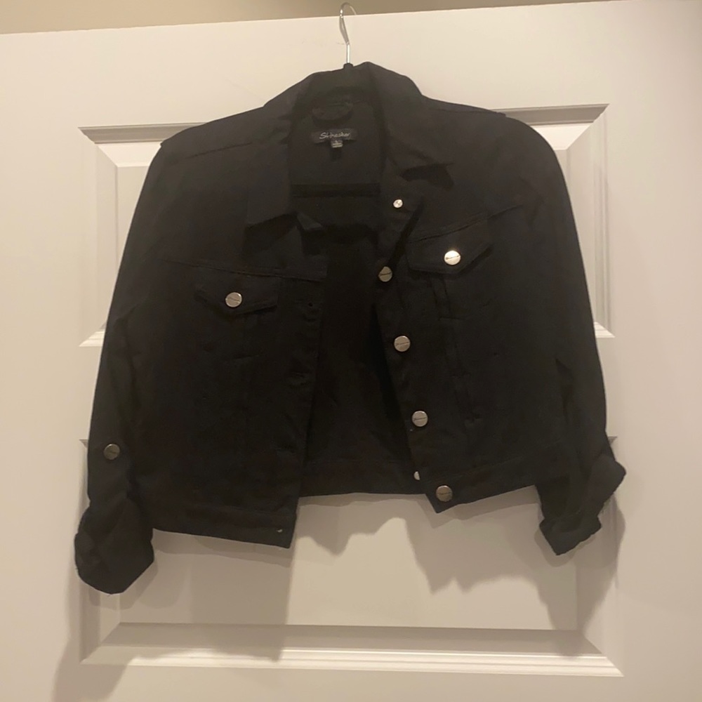 Black jean jacket. Size large